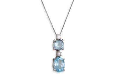 Lot 196 - AN AQUAMARINE AND DIAMOND DROP PENDANT, set...