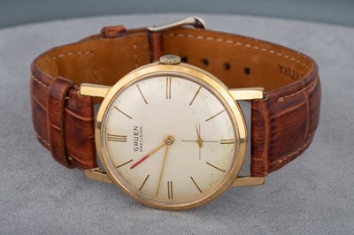 Lot 167 - A GENT'S BRUEN WRISTWATCH, gold plated face,...