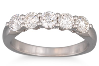 A FIVE STONE DIAMOND RING, the brilliant cut...