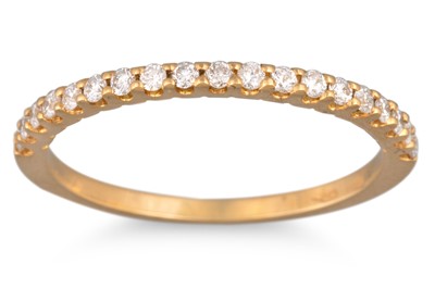 A DIAMOND HALF ETERNITY RING, the brilliant...