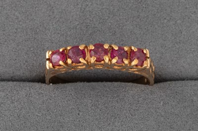 Lot 178 - A FIVE STONE RUBY RING, mounted in 9ct gold,...