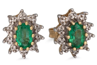 Lot 22 - A PAIR OF EMERALD AND DIAMOND CLUSTER EARRINGS,...