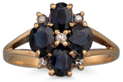 Lot 34 - A DIAMOND AND SAPPHIRE CLUSTER RING, of...