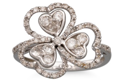 Lot 68 - A DIAMOND RING, in the form of a clover,...