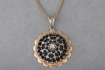 Lot 101 - A VINTAGE 9CT GOLD AND SILVER PENDANT,...