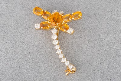 Lot 104 - A CITRINE BROOCH/PENDANT, mounted in 18ct...