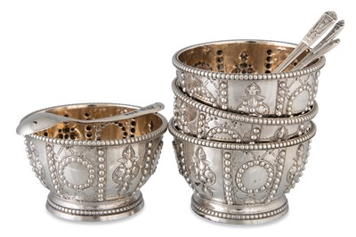 Lot 204 - A SET OF FOUR VICTORIAN SILVER GILT SALTS,...