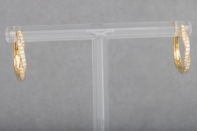 Lot 13 - A PAIR OF DIAMOND SET HOOPS, in 18ct yellow...