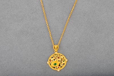 Lot 16 - A 24CT GOLD GEM SET PENDANT, of Eastern style