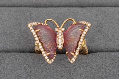 Lot 18 - A TOURMALINE AND DIAMOND SET RING, modelled as...