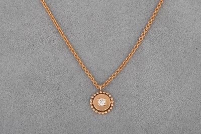 Lot 22 - A DIAMOND SET PENDANT, mounted in 14ct yellow...