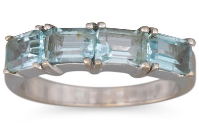 Lot 257 - A FOUR STONE AQUAMARINE RING, mounted in gold,...