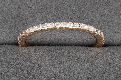 Lot 53 - A DIAMOND ETERNITY RING, mounted in 18ct...