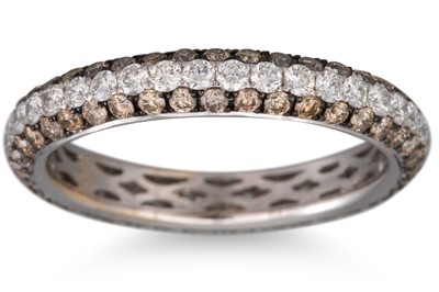 Lot 144 - A DIAMOND PAVÉ SET RING, set with champagne...