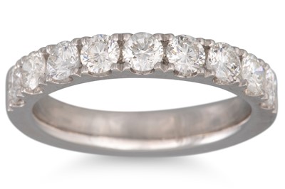 Lot 145 - A DIAMOND HALF ETERNITY RING, the brilliant...