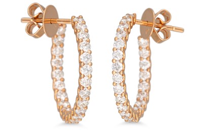 Lot 167 - A PAIR OF DIAMOND HOOP EARRINGS, the brilliant...