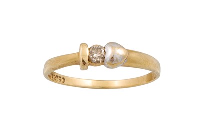 Lot 270 - A DIAMOND SET RING, tension set in 18ct yellow...