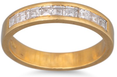 Lot 281 - A DIAMOND HALF ETERNITY RING, the princess cut...