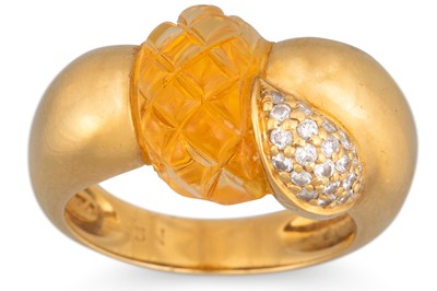 Lot 286 - A CITRINE AND DIAMOND RING, of cross over...