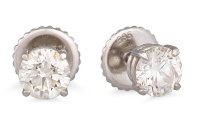 Lot 335 - A PAIR OF DIAMOND EARRINGS, the round...