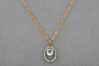 Lot 84 - AN AQUAMARINE AND DIAMOND PENDANT, mounted in...