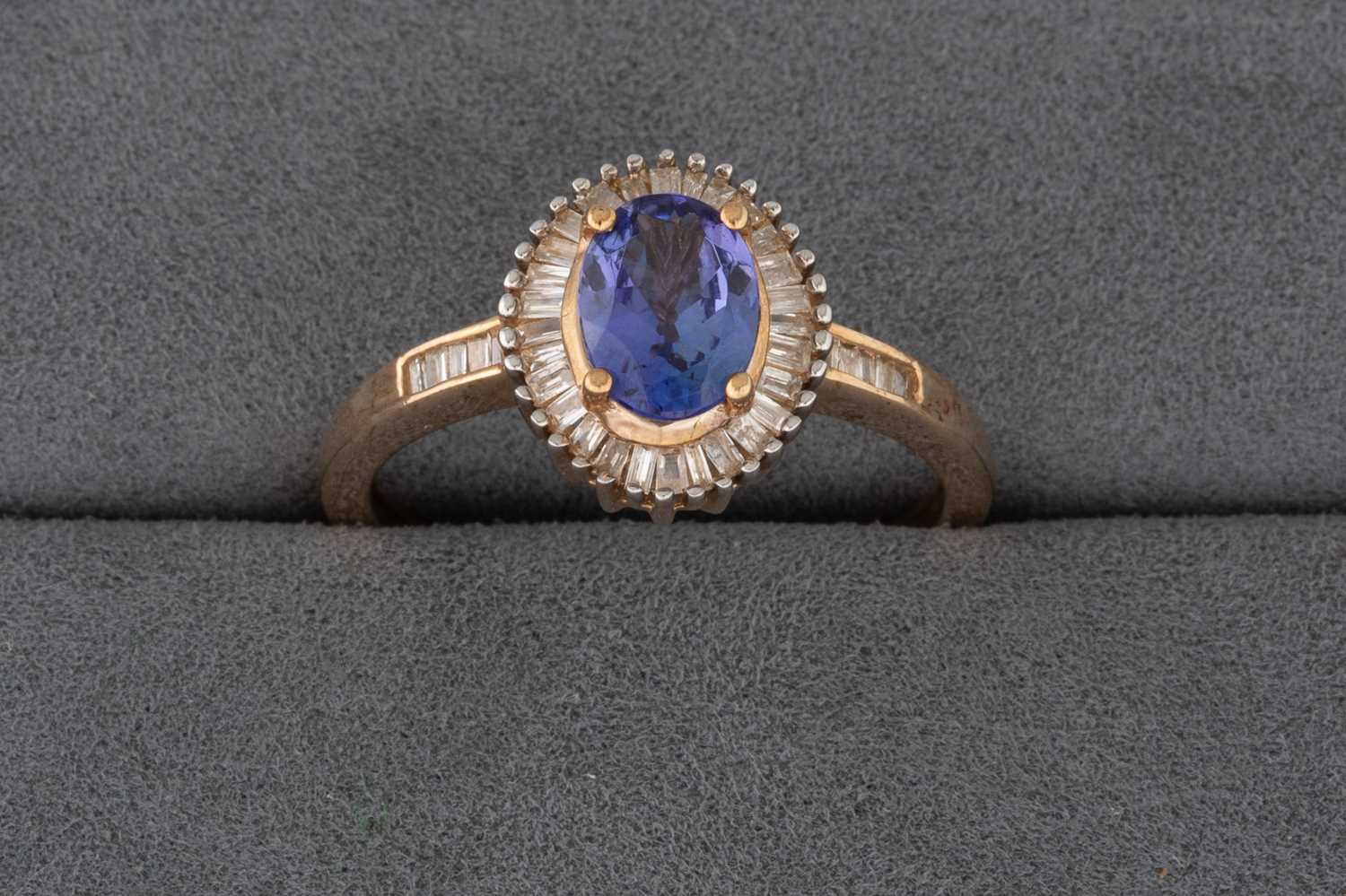 Lot 89 - A TANZANITE RING, mounted in 9ct gold, size O
