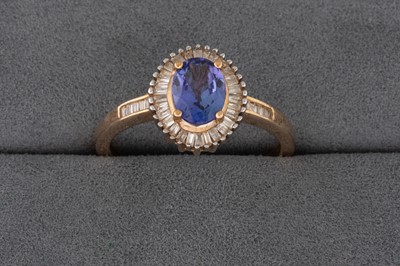 Lot 89 - A TANZANITE RING, mounted in 9ct gold, size O