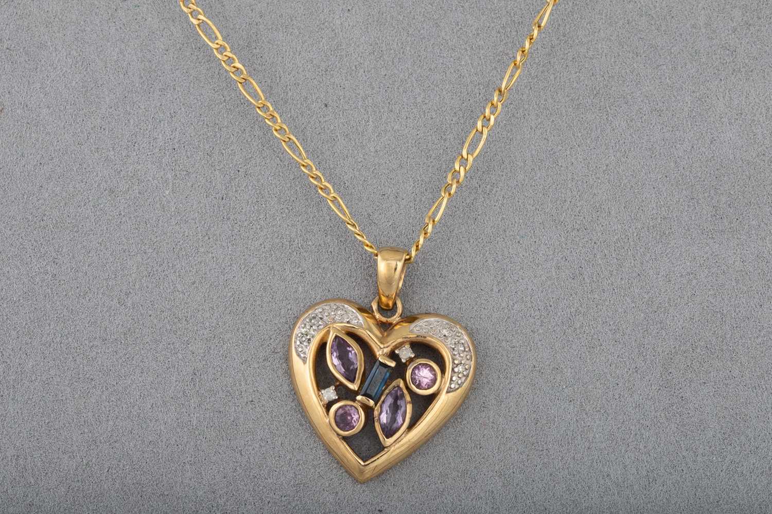 Lot 91 - A 9CT GOLD GEM-SET PENDANT