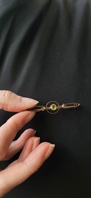 Lot 10 - A 9CT GOLD GEM-SET BROOCH, together with two...