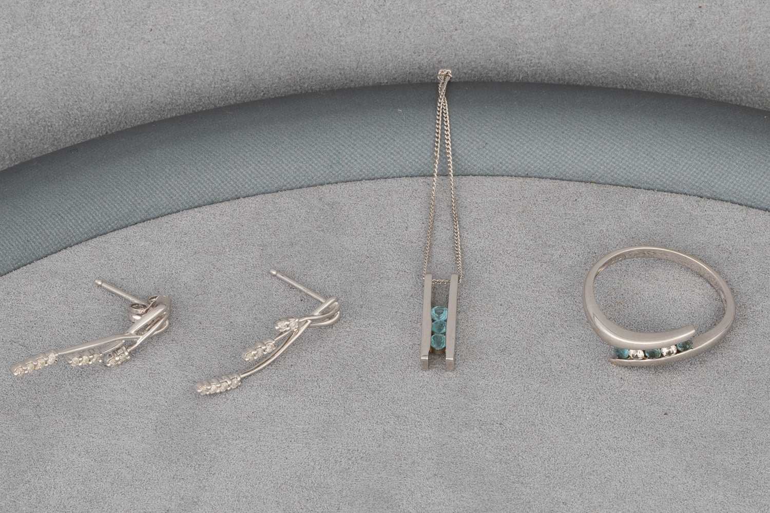 Lot 96 - A TOPAZ SET PENDANT, together with a ring &...