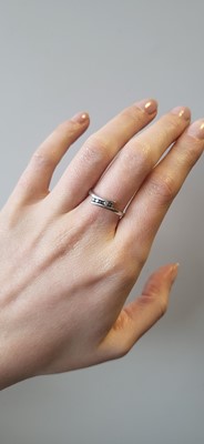 Lot 12 - A TOPAZ SET PENDANT, together with a ring &...