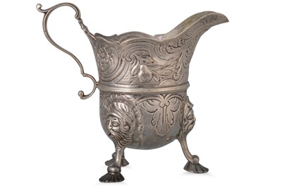 Lot 418 - A GEORGE II SILVER CREAM JUG, Dublin c 1750,...