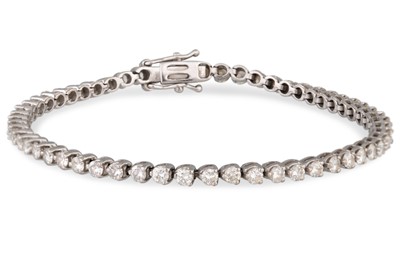 Lot 107 - A DIAMOND LINE BRACELET, the round billiant...