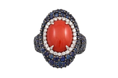 Lot 374 - A CORAL, DIAMOND AND SAPPHIRE RING, the...