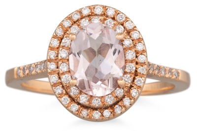 Lot 123 - A PINK MORGANITE AND DIAMOND RING, the oval...