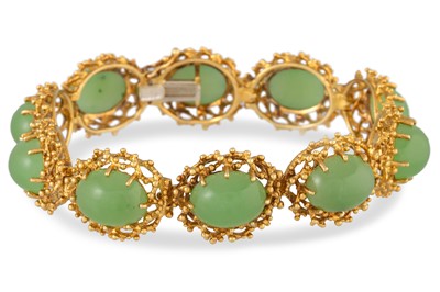 Lot 182 - A JADE BRACELET, the oval jade stones to wired...