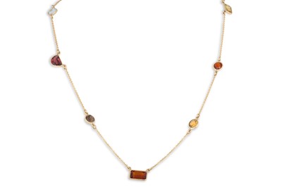 Lot 185 - A CITRINE, TOURMALINE, GARNET AND SMOKY QUARTZ...