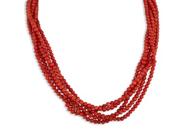 Lot 187 - A MULTI STRANDED CORAL BEADED NECKLACE, to an...