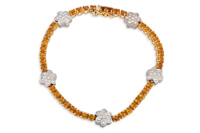 Lot 192 - A CITRINE AND DIAMOND LINE BRACELET, pave...