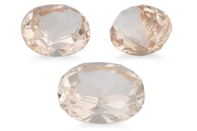 Lot 238 - THREE LOOSE TOPAZ STONES, polished