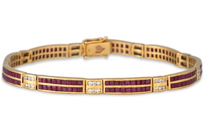 Lot 150 - A RUBY AND DIAMOND BRACELET, channel set in...