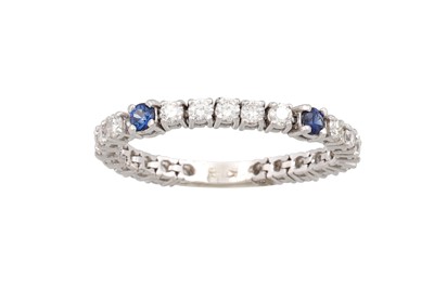 Lot 378 - A DIAMOND ETERNITY RING, of flexible form, the...