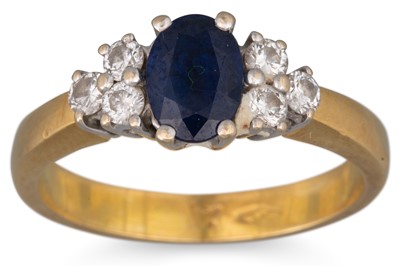 Lot 160 - A SAPPHIRE AND DIAMOND RING, the oval sapphire...