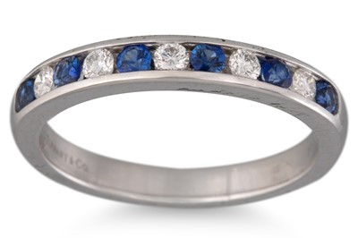 Lot 244 - A DIAMOND AND SAPPHIRE HALF ETERNITY RING,...