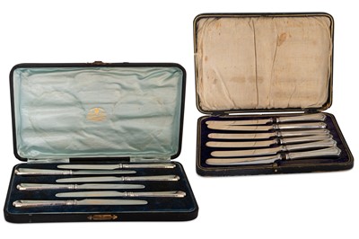 Lot 388 - A PRE-WAR SET OF SILVER HANDLED KNIVES, cased...