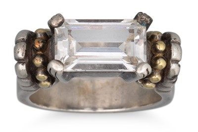 Lot 307 - A TOPAZ SET SILVER RING, with 18ct gold...