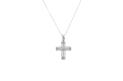 Lot 384 - A DIAMOND SET CROSS, the brilliant cut...