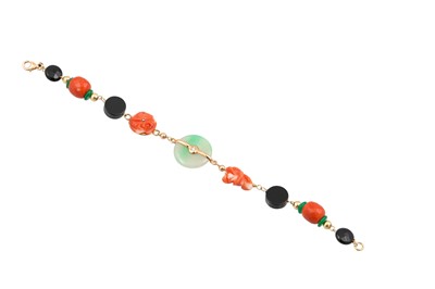 Lot 388 - A GEM SET BRACELET, set with coral, onyx and...