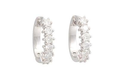 Lot 396 - A PAIR OF HALF HOOP DIAMOND EARRINGS, the...