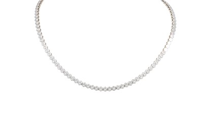 Lot 398 - A DIAMOND LINE NECKLACE, the brilliant cut...